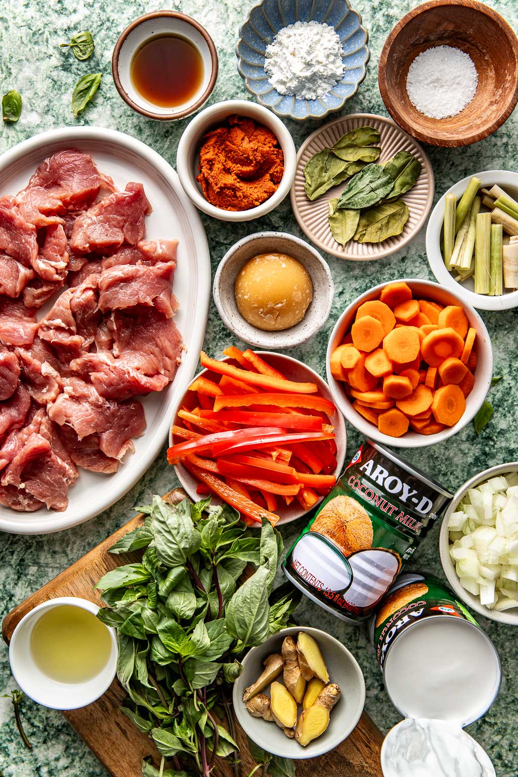 Thai panang curry with pork ingredients laid out