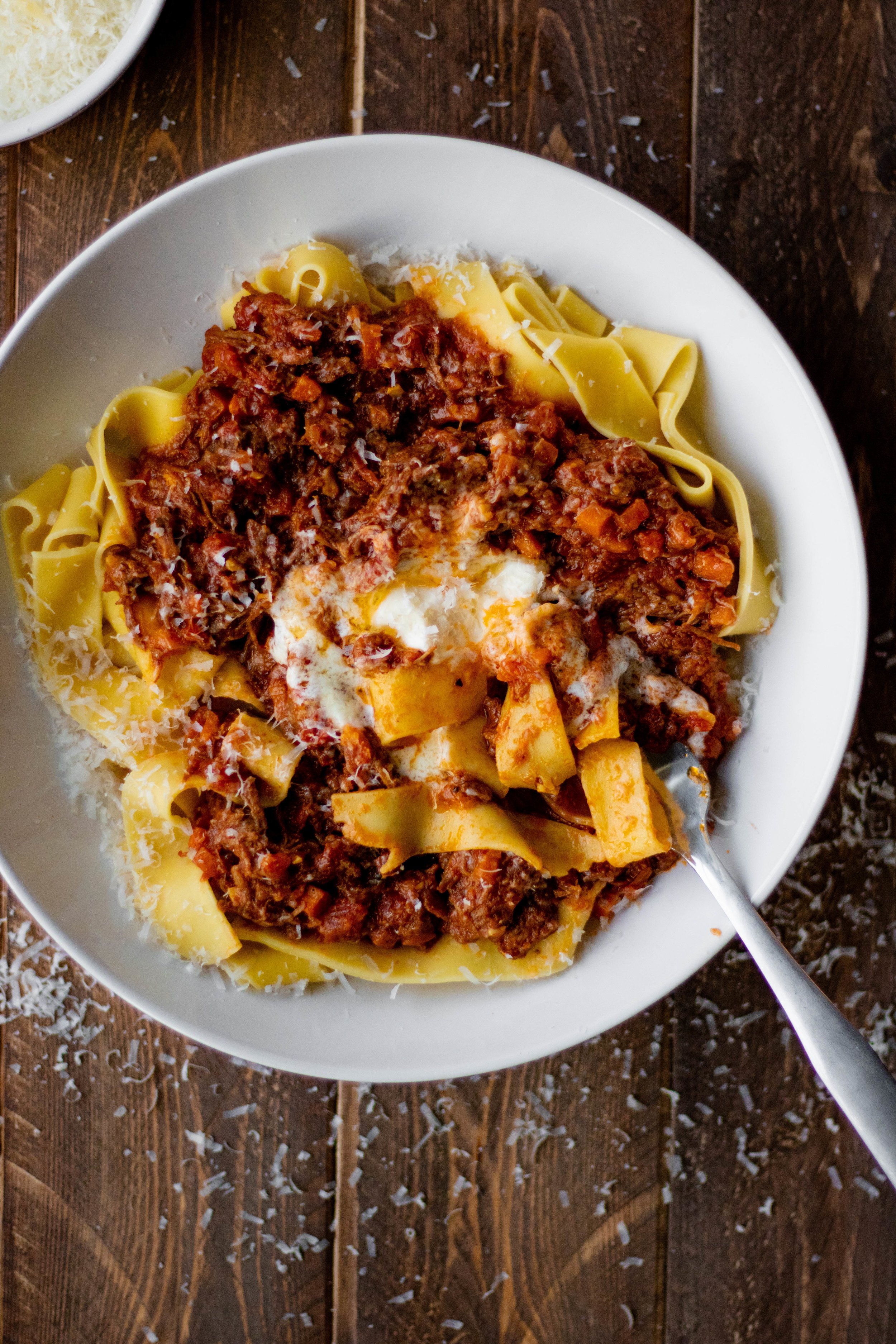 instant pot beef ragu and pappardelle in a white pasta bowl 