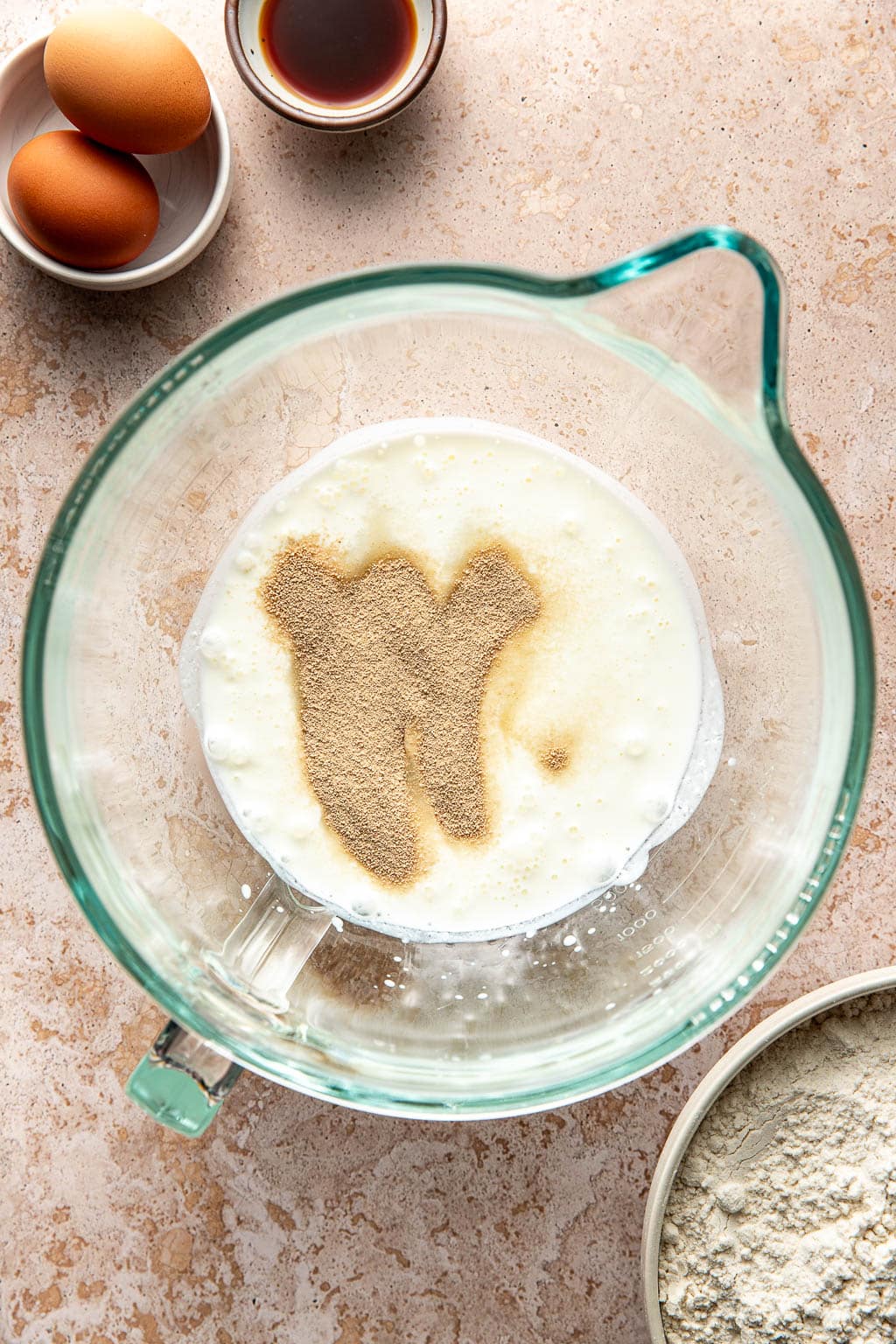 yeast blooming in buttermilk in a mixing bowl