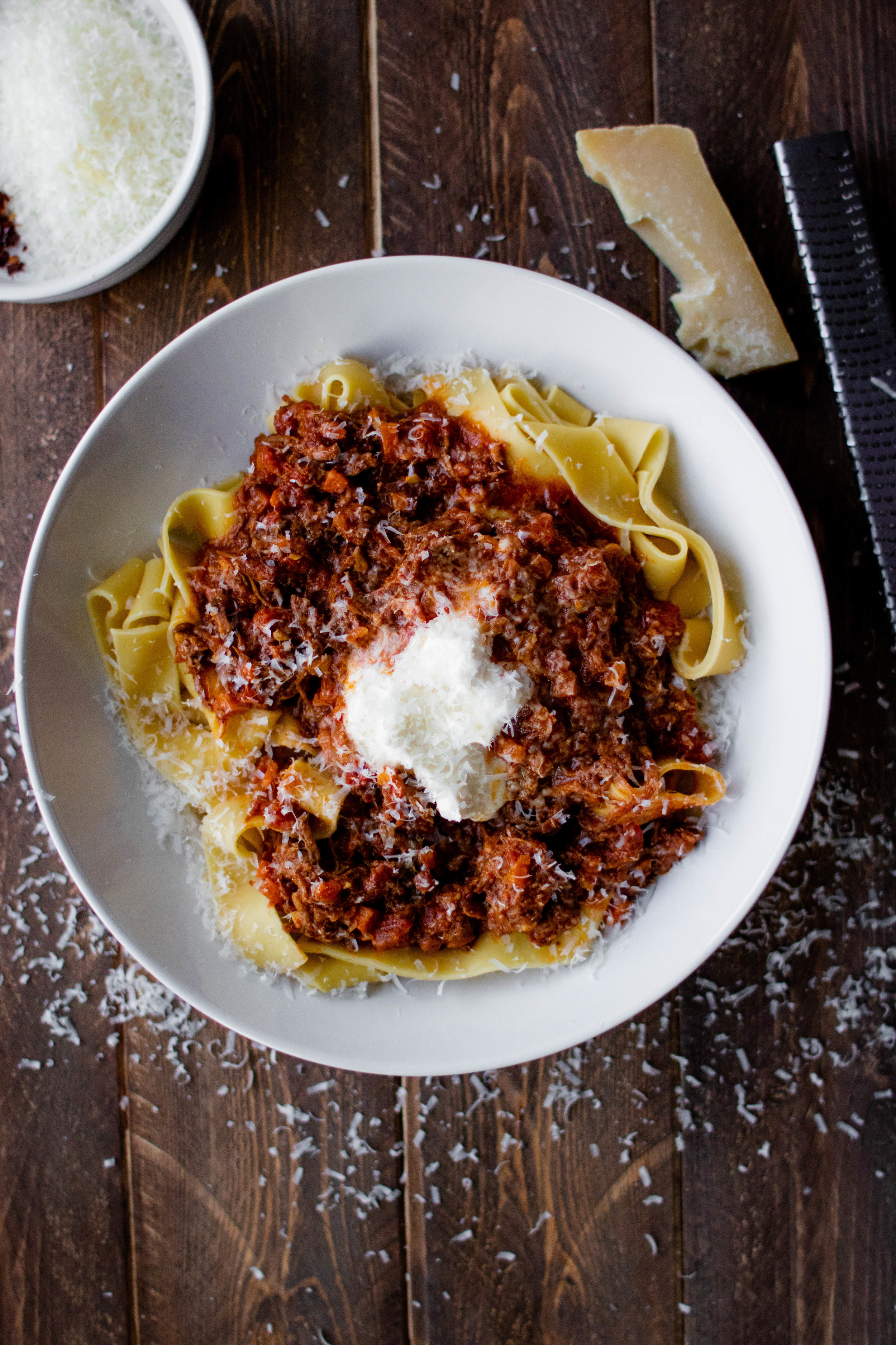 instant pot beef ragu and pappardelle in a white pasta bowl 
