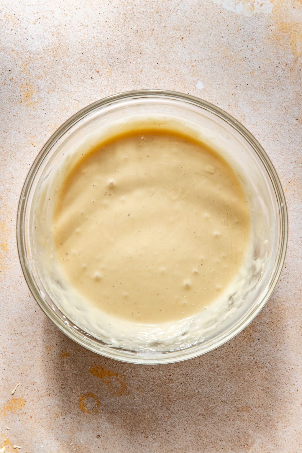 eggnog glaze in a clear mixing bowl