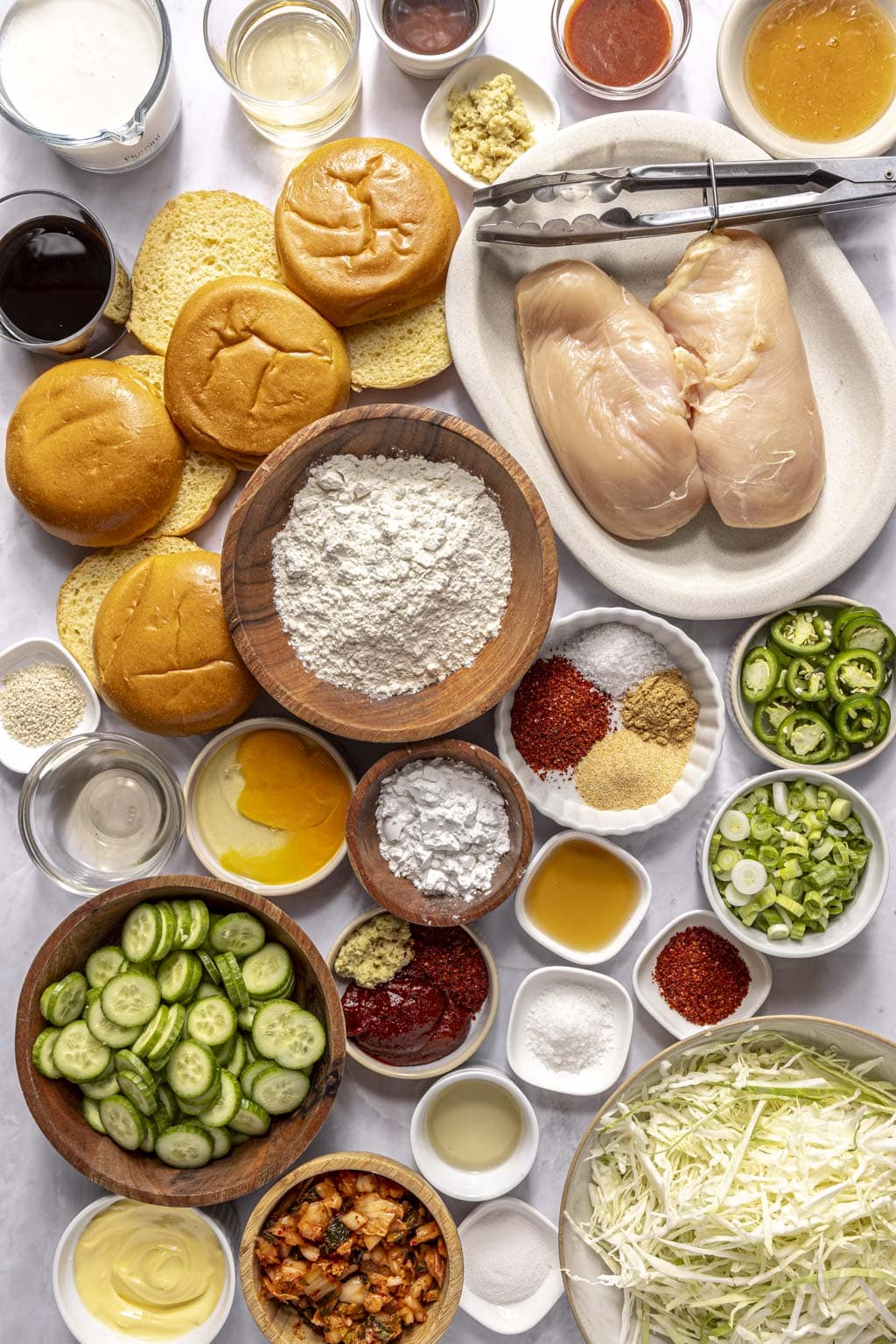 spicy Korean fried chicken sandwiches ingredients laid out