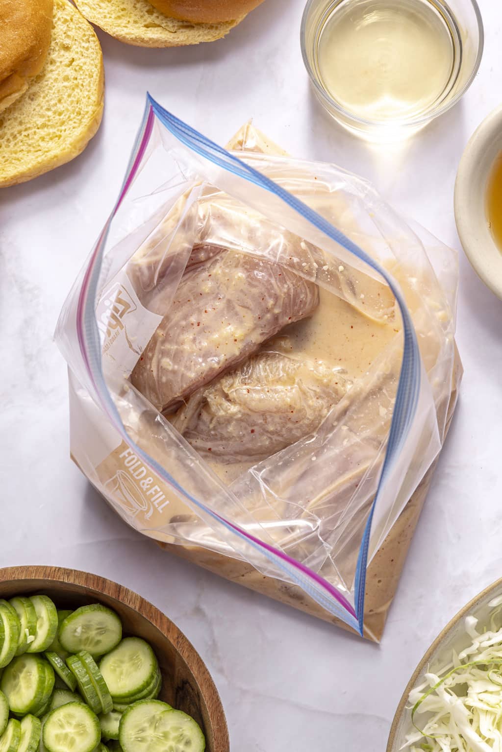 chicken in a ziplock bag marinating 