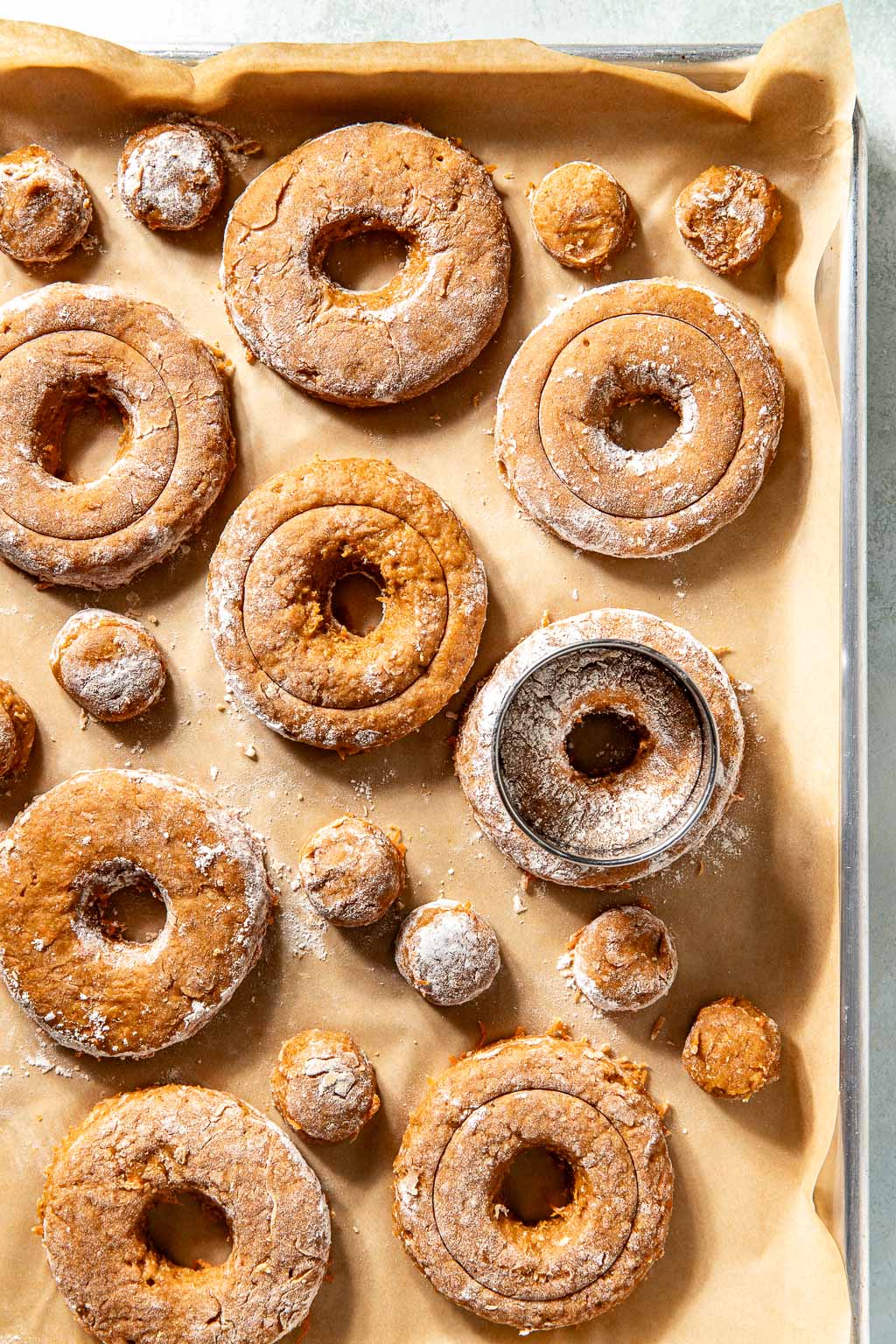 donuts on a baking sheet before frying