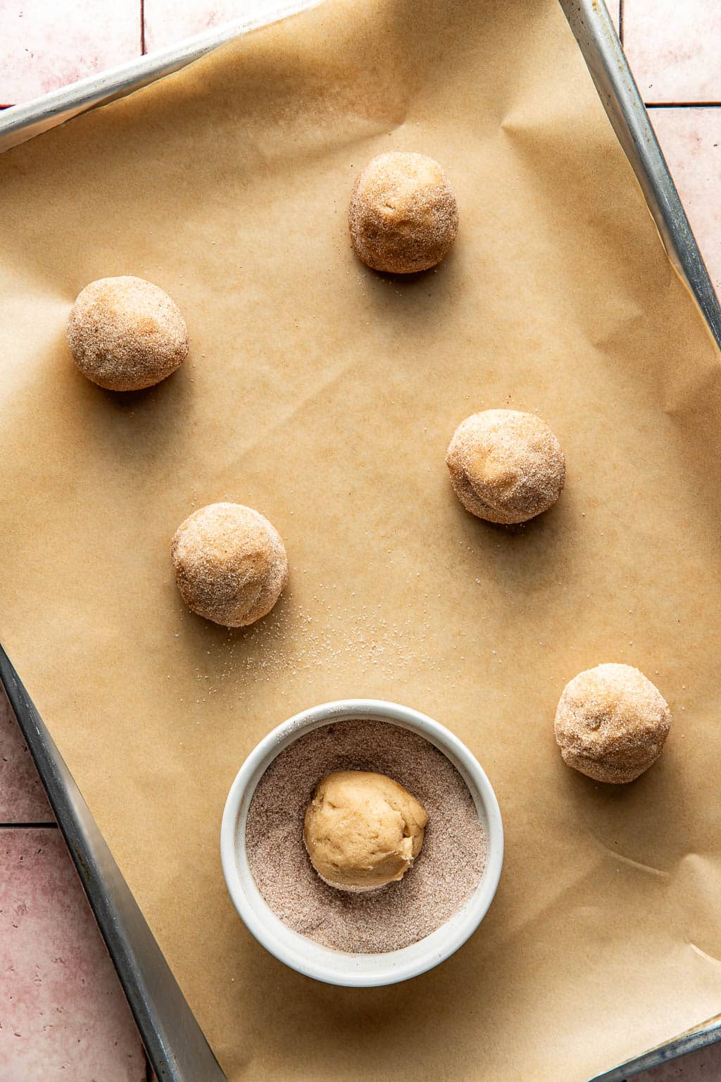 eggnog snickerdoodle cookies on a baking sheet before baking