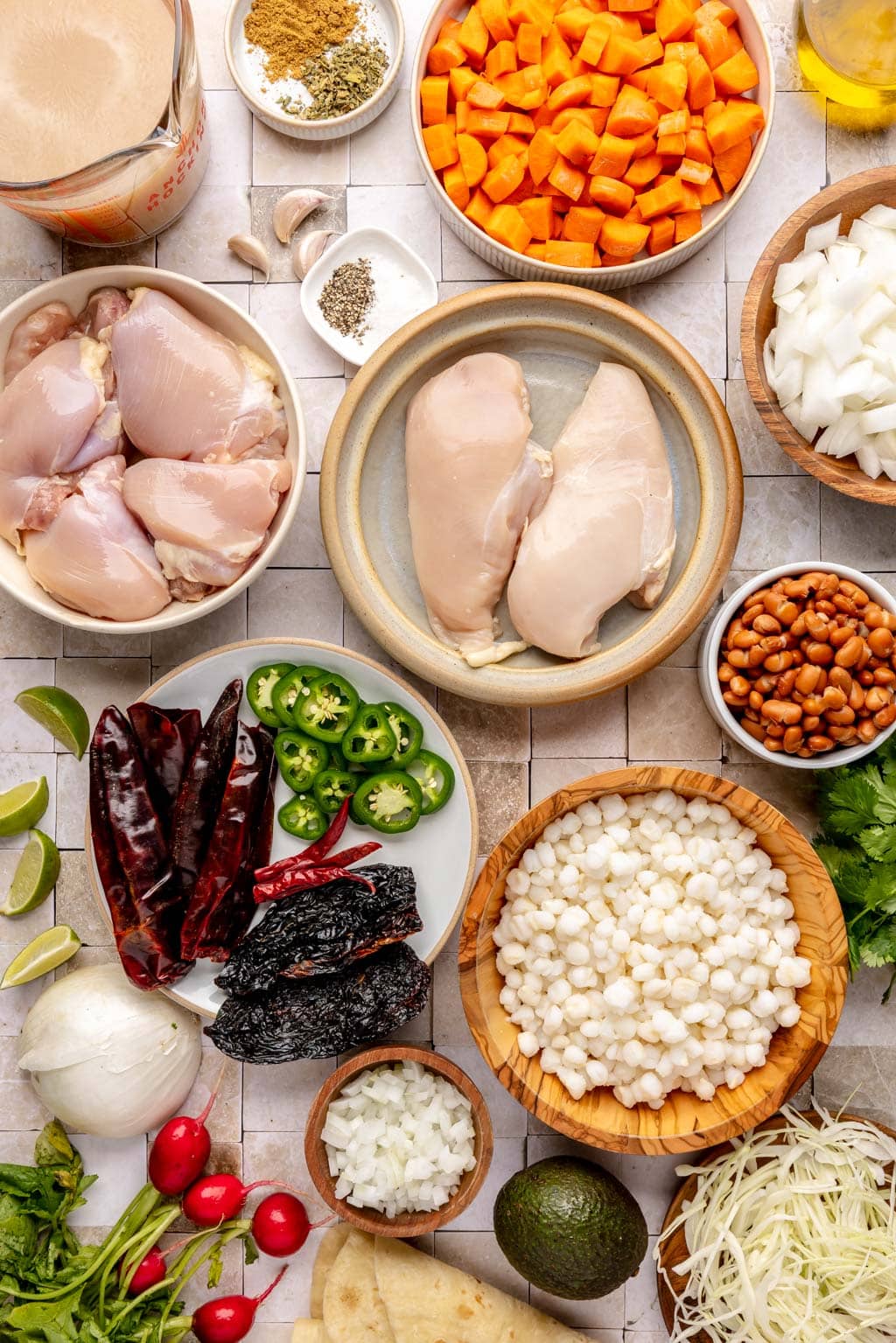 Red pozole with chicken ingredients laid out