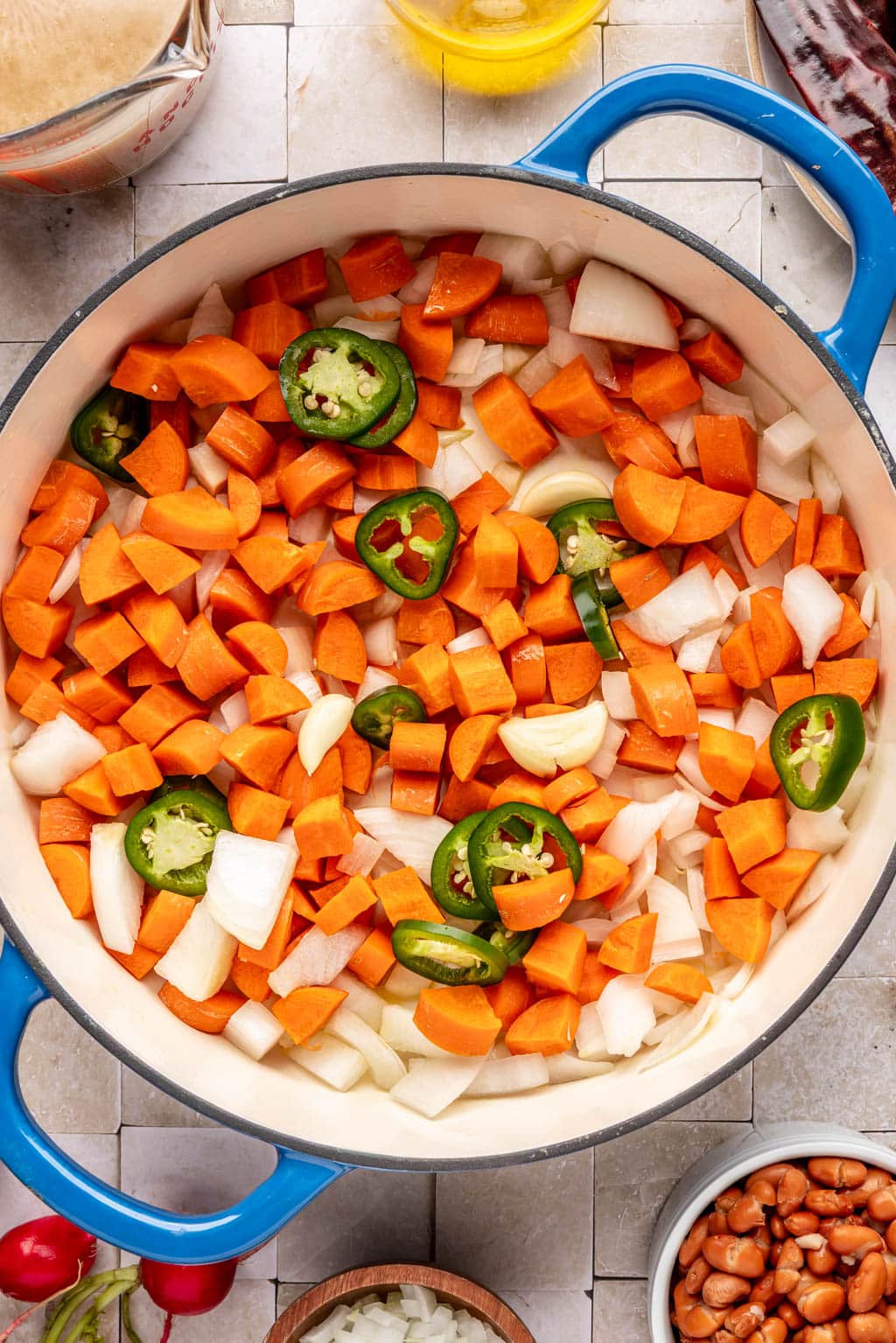 Veggies and aromatics in a Dutch oven 