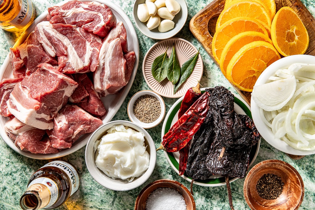 beer braised carnitas tacos ingredients laid out
