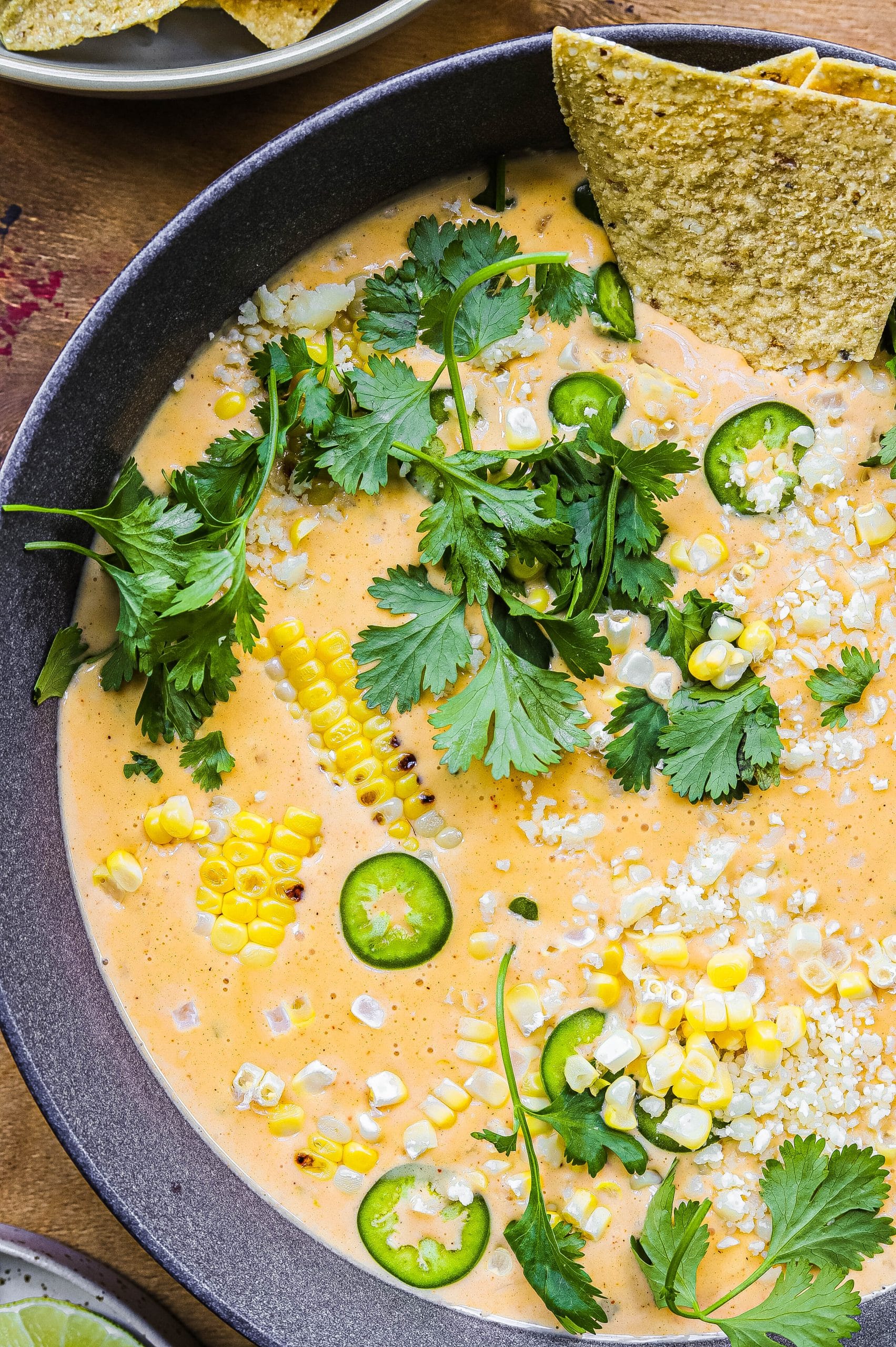 Street corn queso topped with cilantro, jalapeno, and cotija cheese