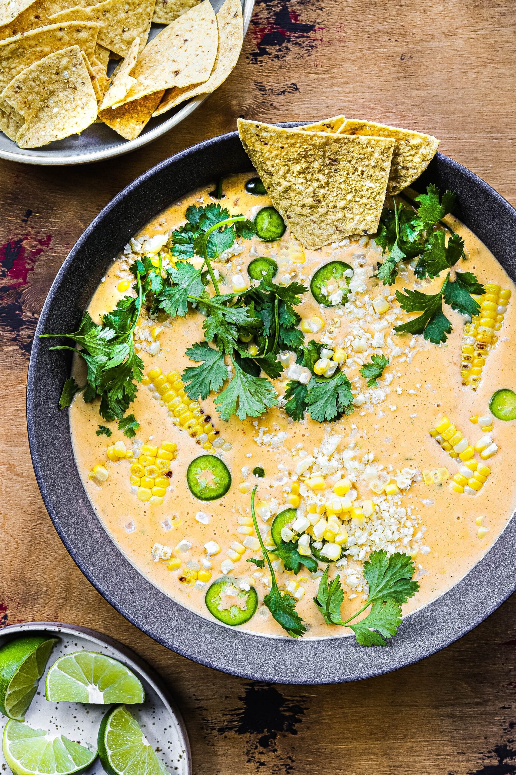 Street corn queso topped with cilantro, jalapeno, and cotija cheese