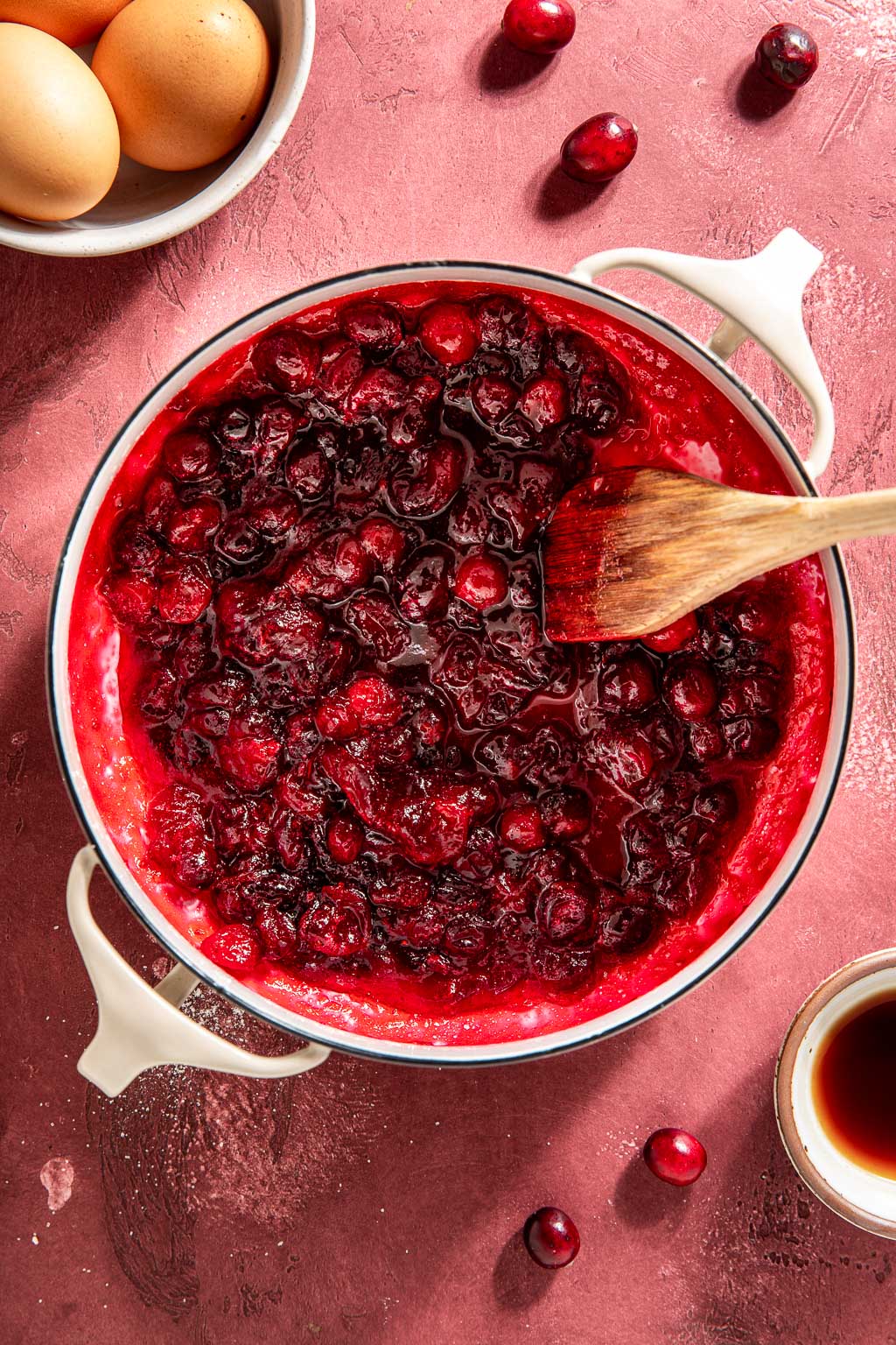 cooked cranberry sauce for the ricotta cake in a white pot