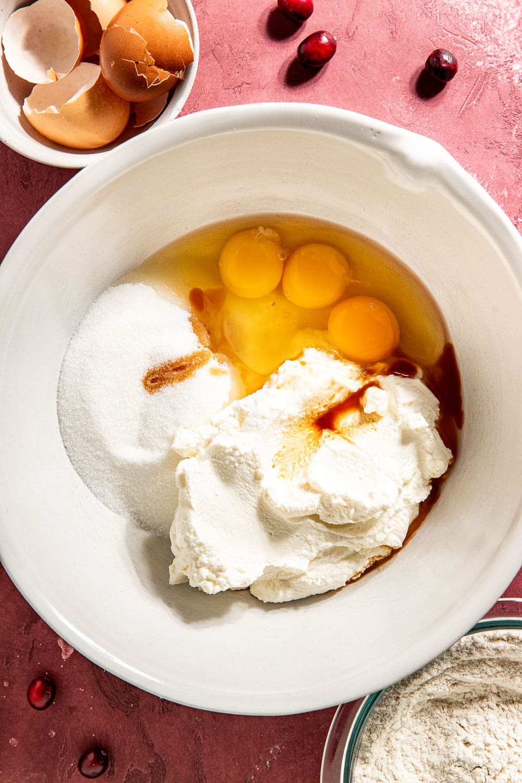wet ingredients for the cake in a white mixing bowl