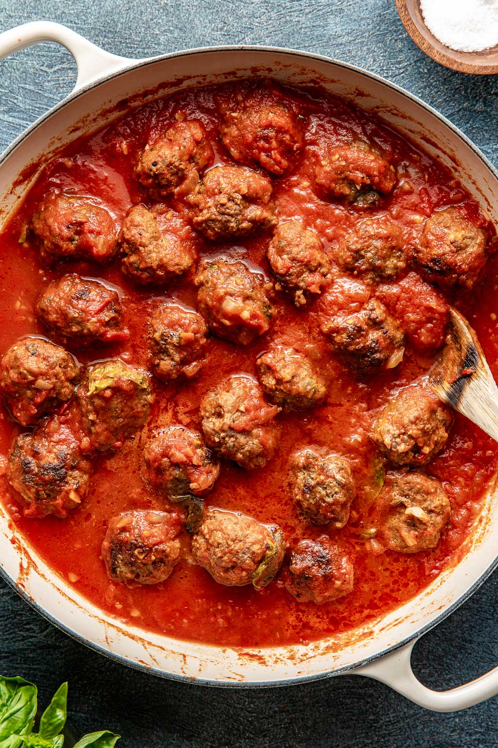 meatballs in sauce in a dutch oven after simmering