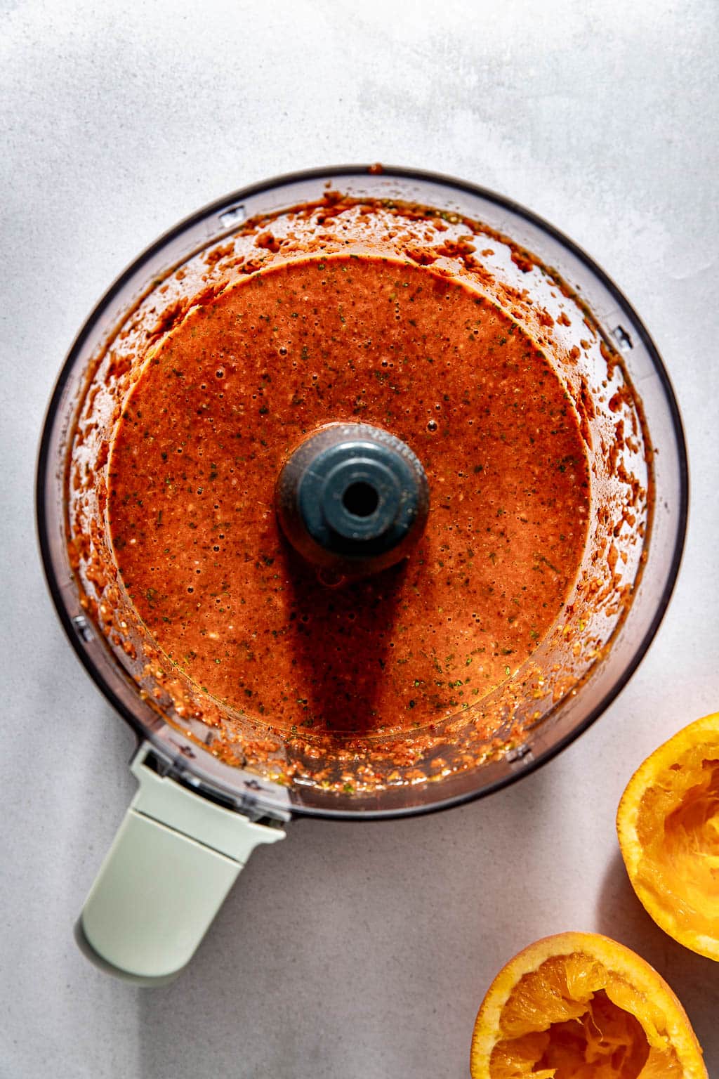 pollo asado marinade in a food processor bowl after blending