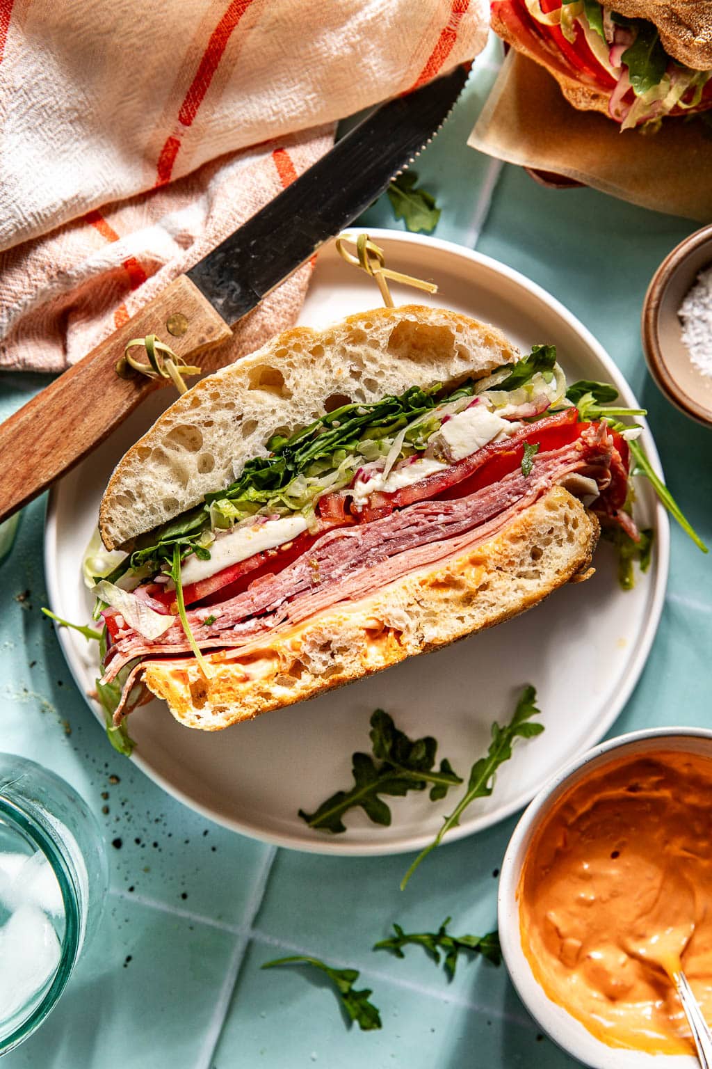 an italian sandwich on a plate