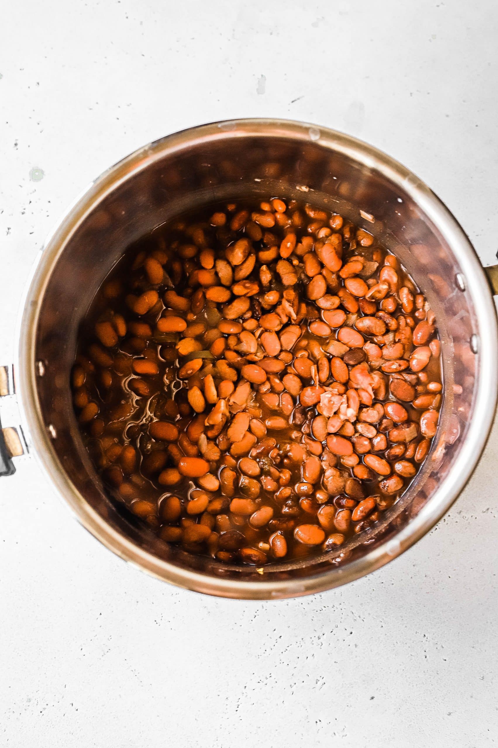 Cooked pinto beans in an Instant Pot insert 