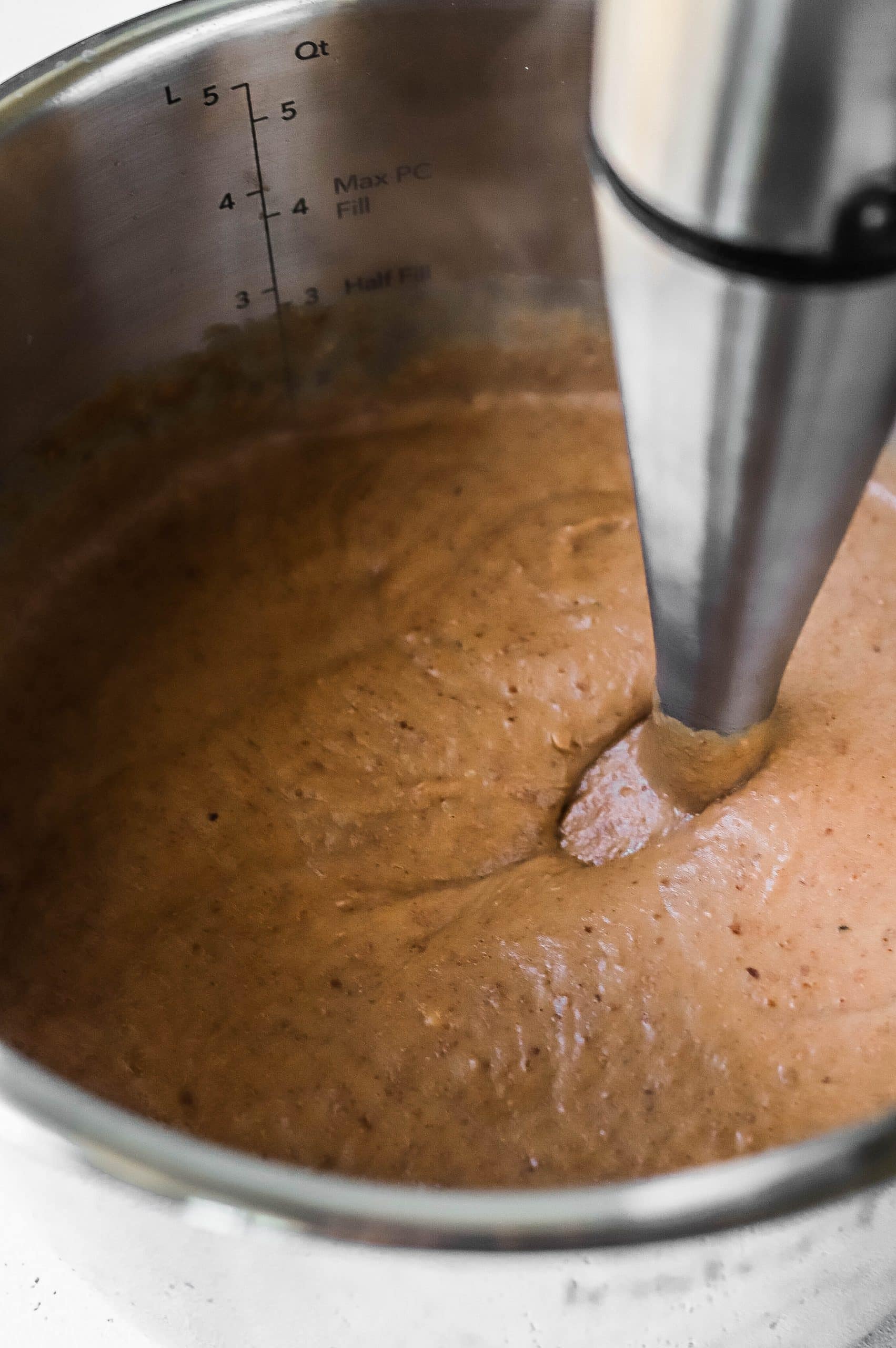 Pureeing refried beans with an immersion blender 