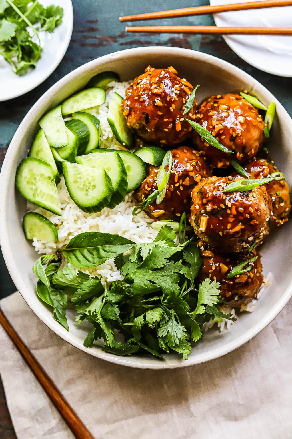 sesame ginger meatballs over rice 