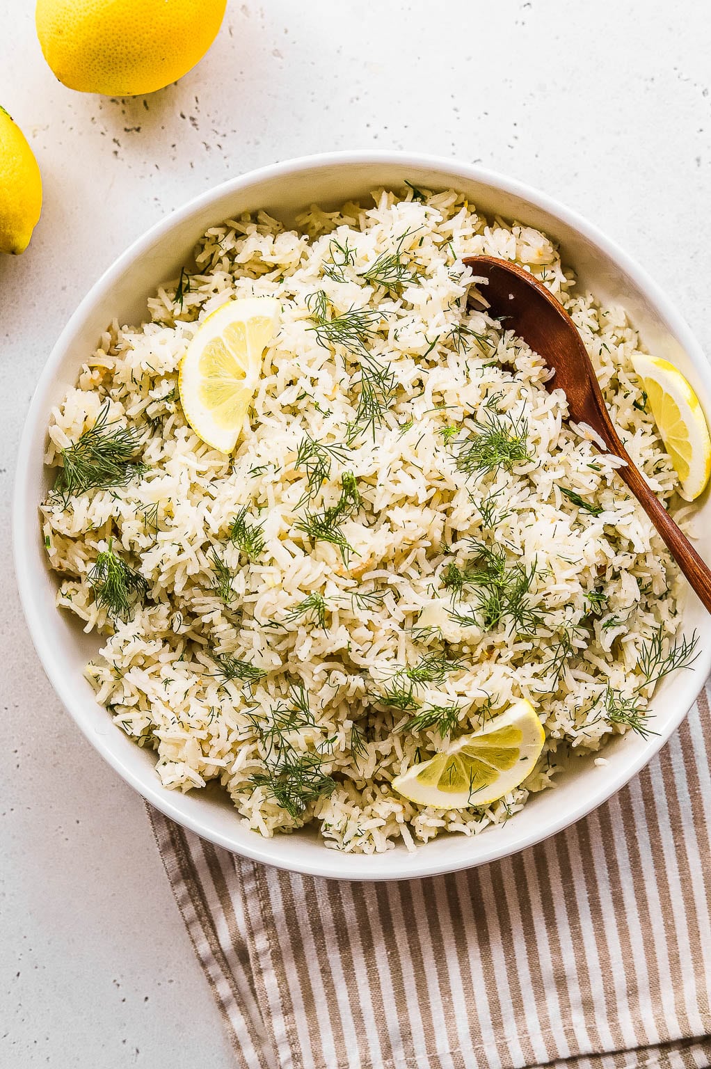 Overhead view of lemon dill rice in a serving bowl 