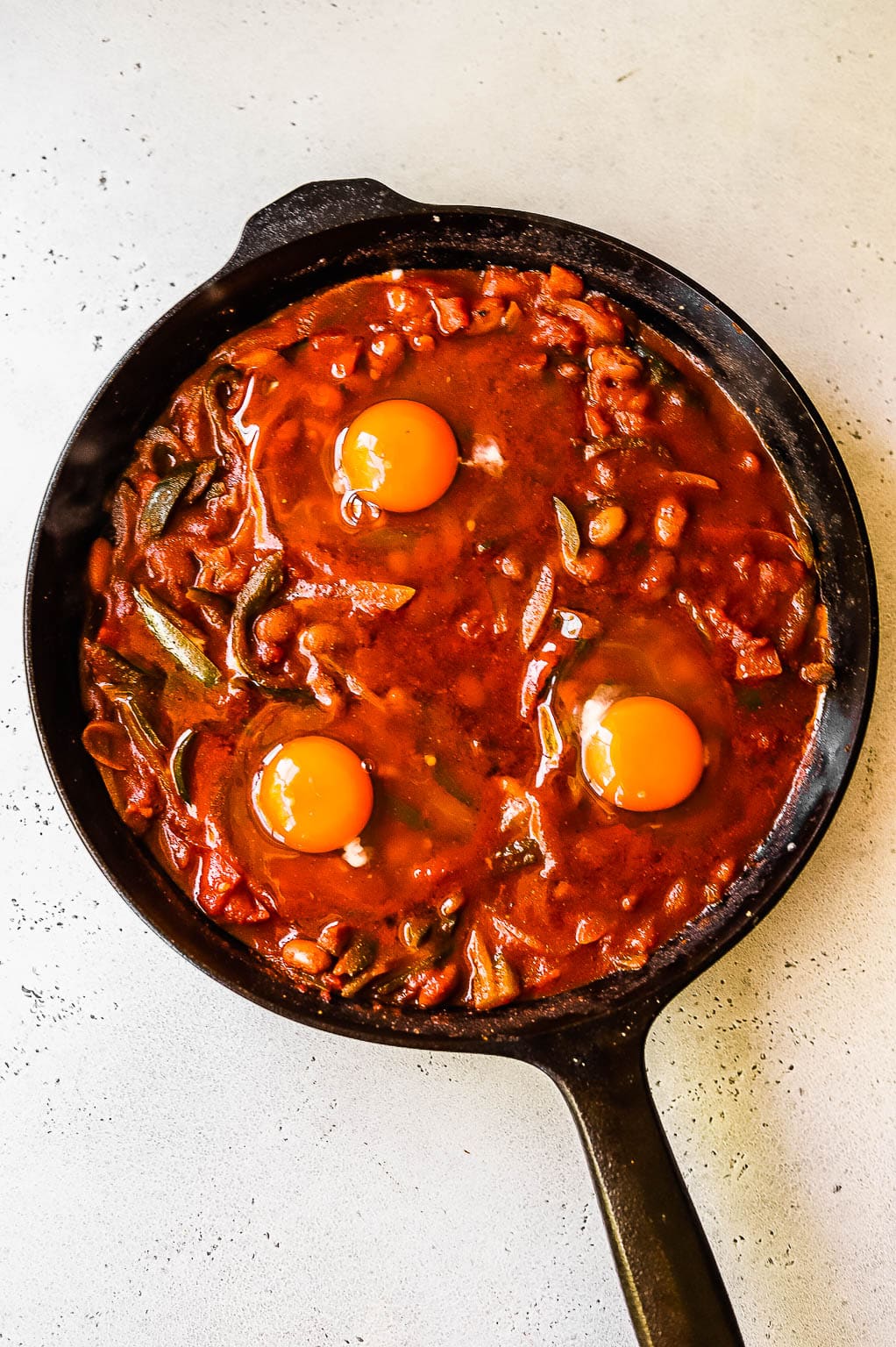 Huevos rancheros partway through cooking 