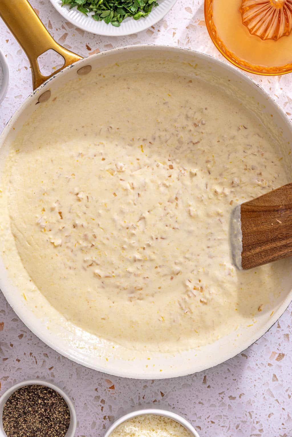 Creamy lemon sauce in a skillet