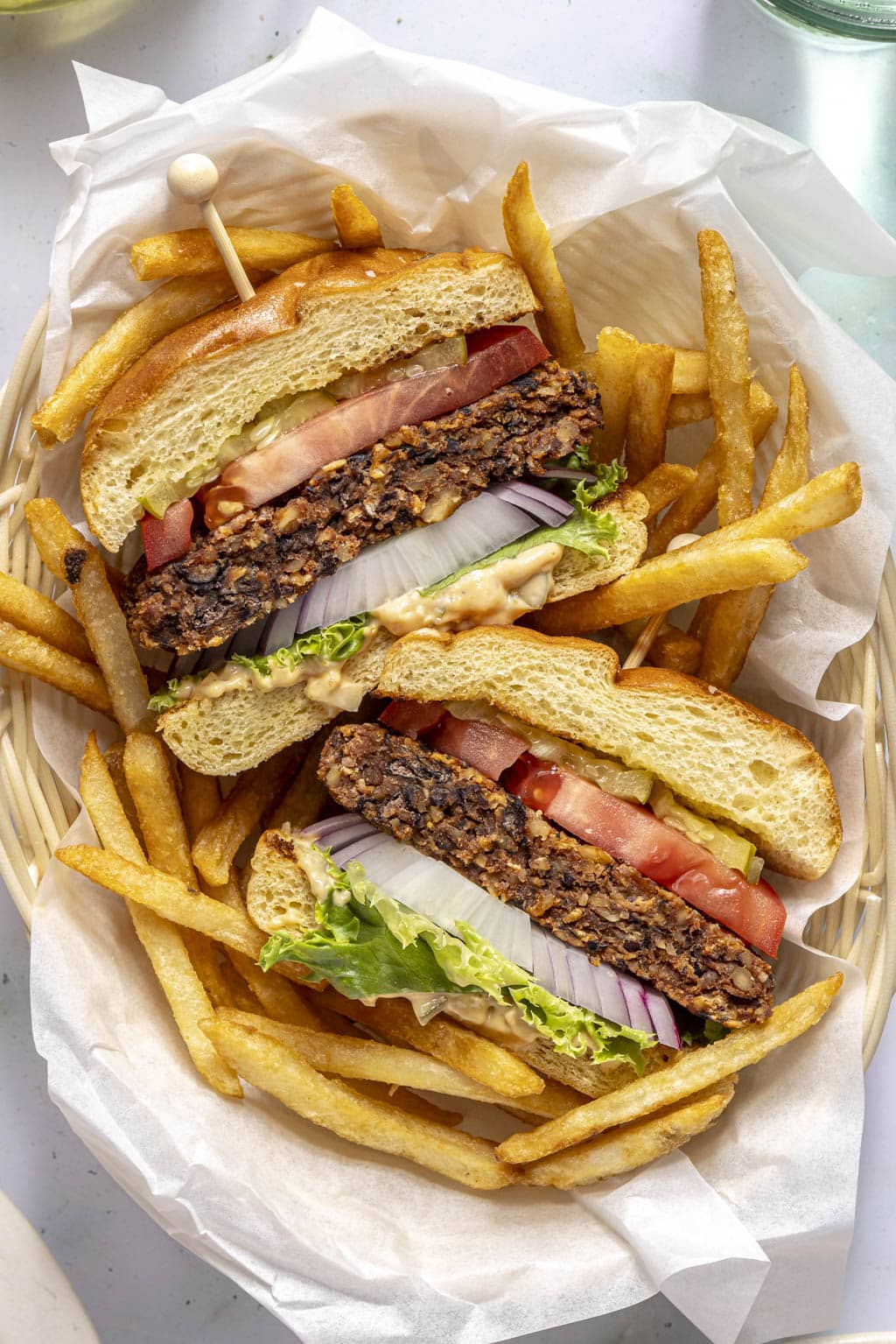 A black bean walnut burger cut in half to show texture