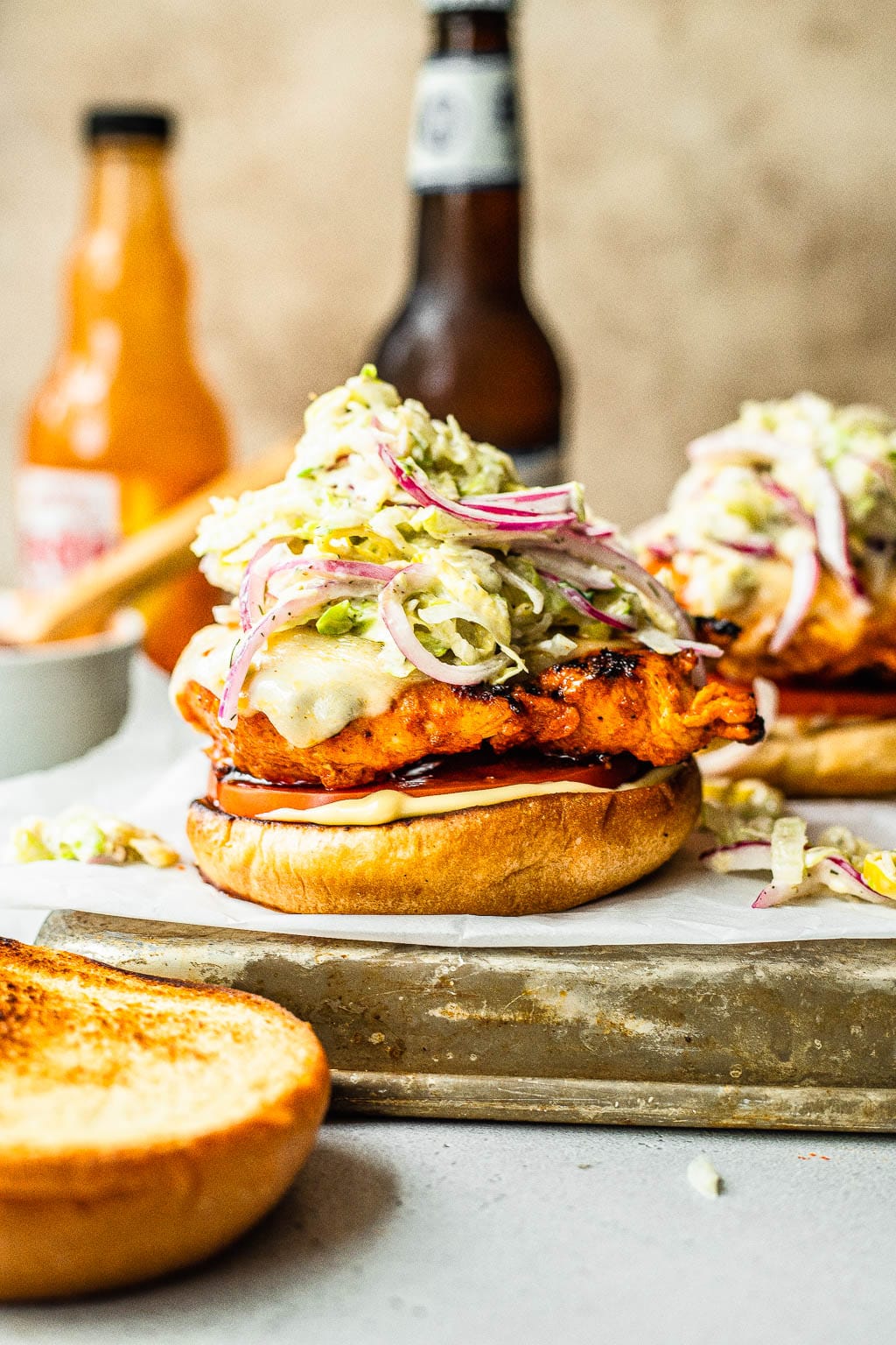 grilled buffalo chicken sandwich topped with grinder slaw