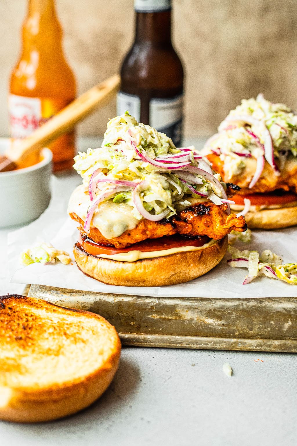 grilled buffalo chicken sandwiches with grinder slaw on top 