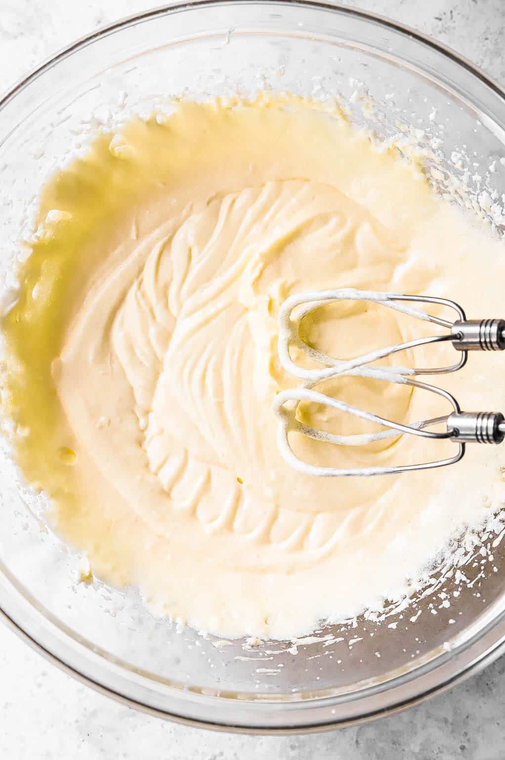 Wet ingredients for coffee cake mixed together in bowl 