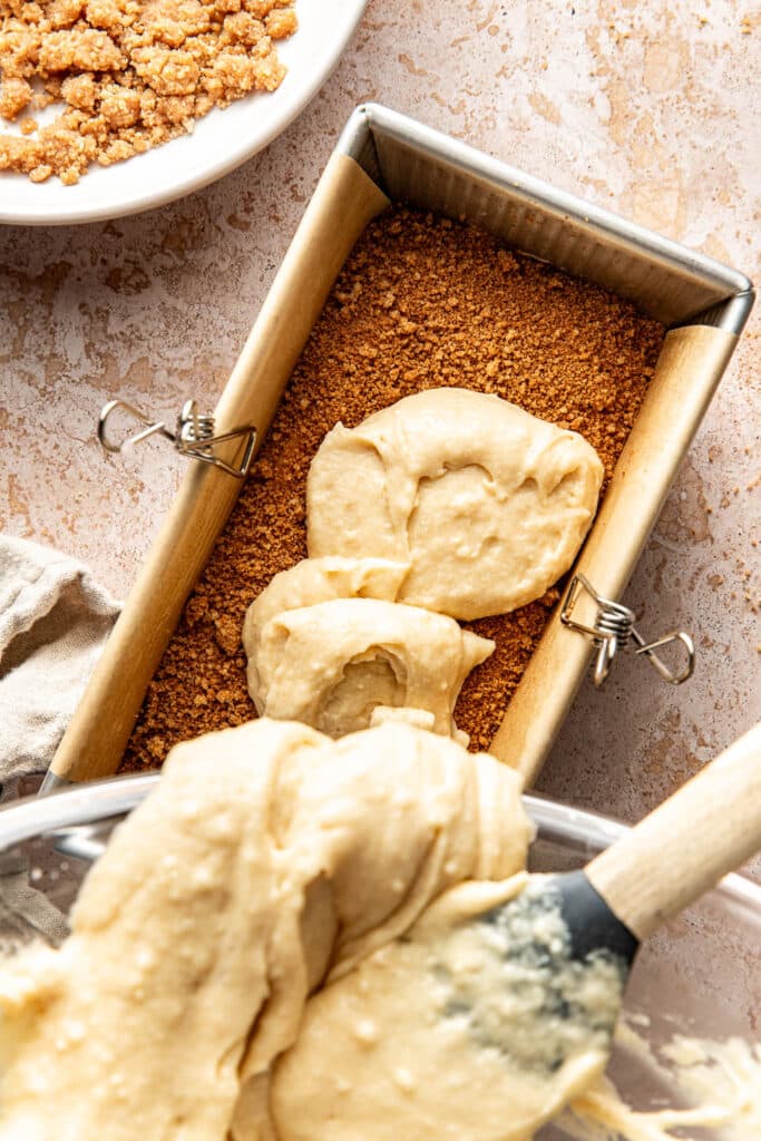 Assembly step showing how to add cinnamon sugar to center of coffee cake