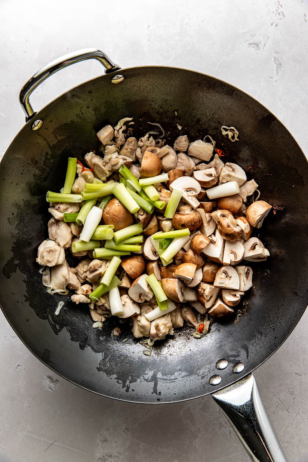 chicken and vegetables in a wok 
