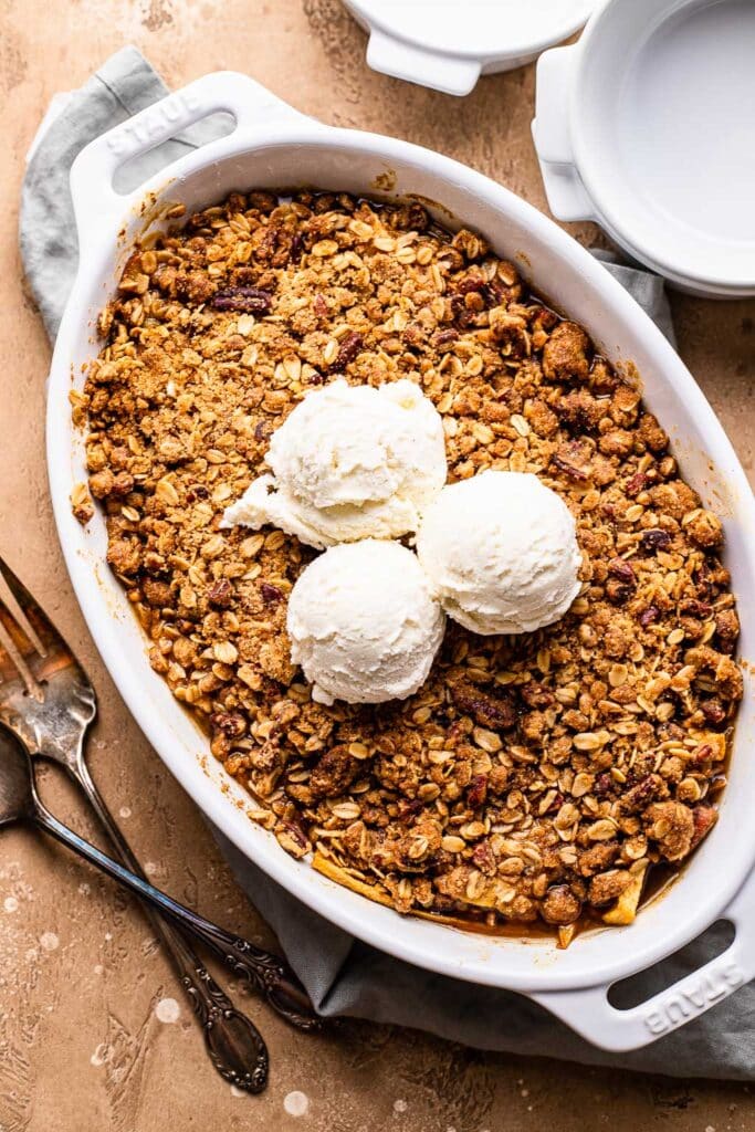 Apple Pear Crisp topped with scoops of ice cream