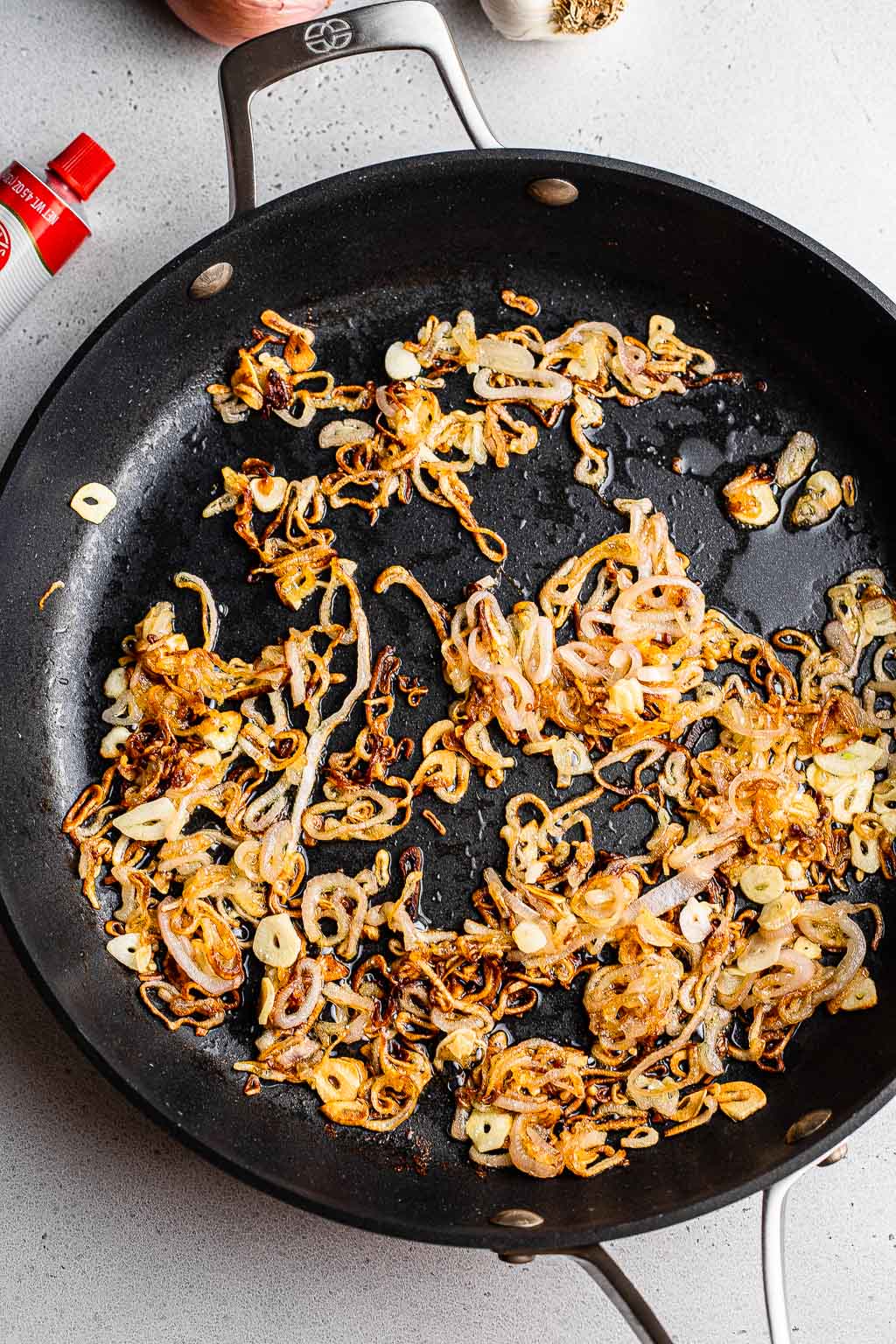 Caramelized shallots in a skillet