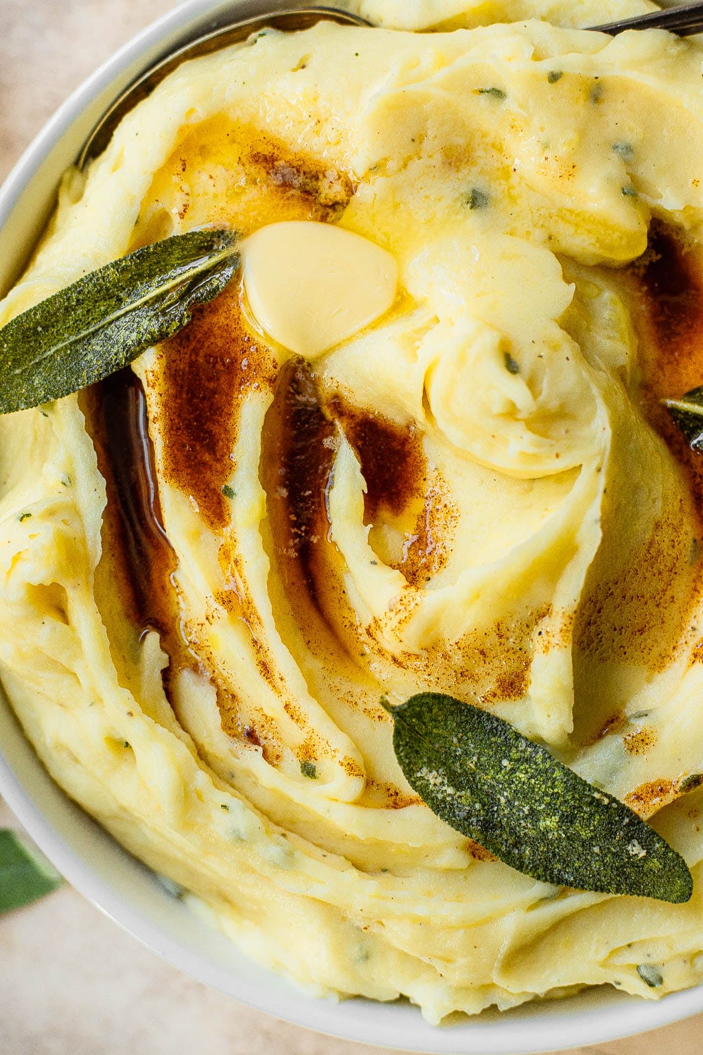 Roasted Garlic Mashed Potatoes topped with sage