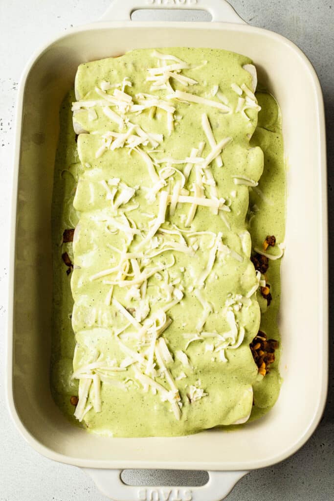 Green beef enchiladas, ready to be baked 