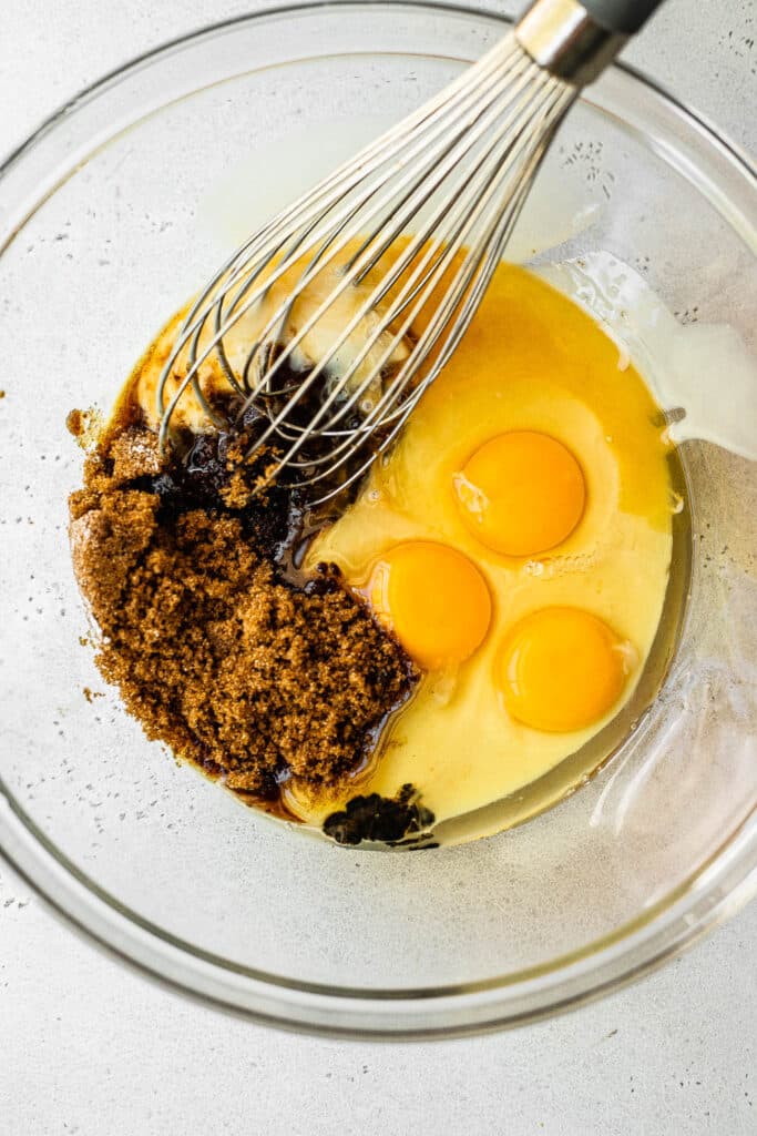 Pecan pie filling ingredients in a mixing bowl