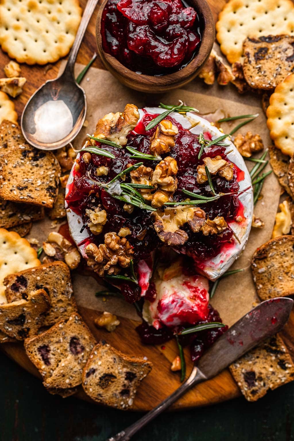 Cranberry Baked Brie surrounded by crackers 
