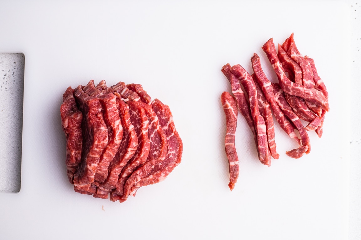 sliced filet mignon on a cutting board