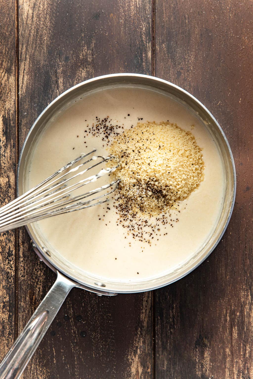 Béchamel sauce in a saucepan. 
