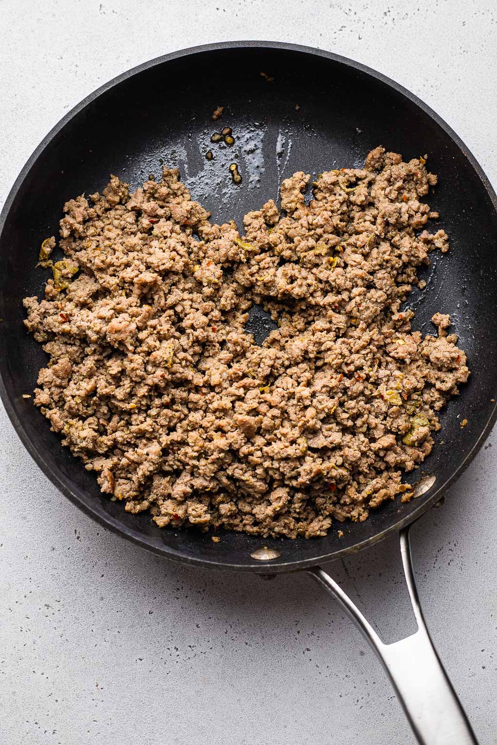 Browned breakfast sausage in a skillet 