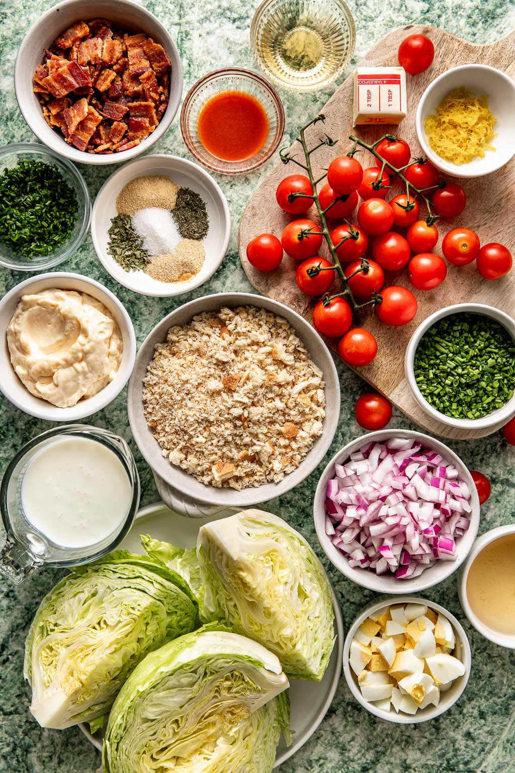 loaded wedge salad ingredients laid out