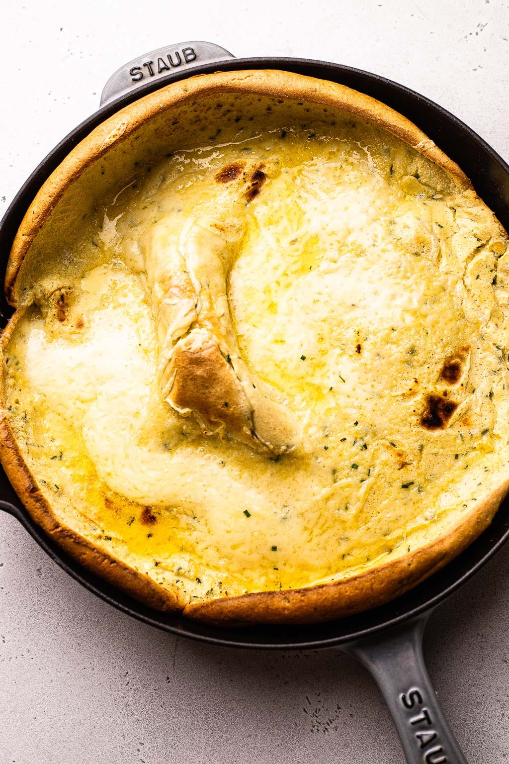 ham and cheese dutch baby after baking