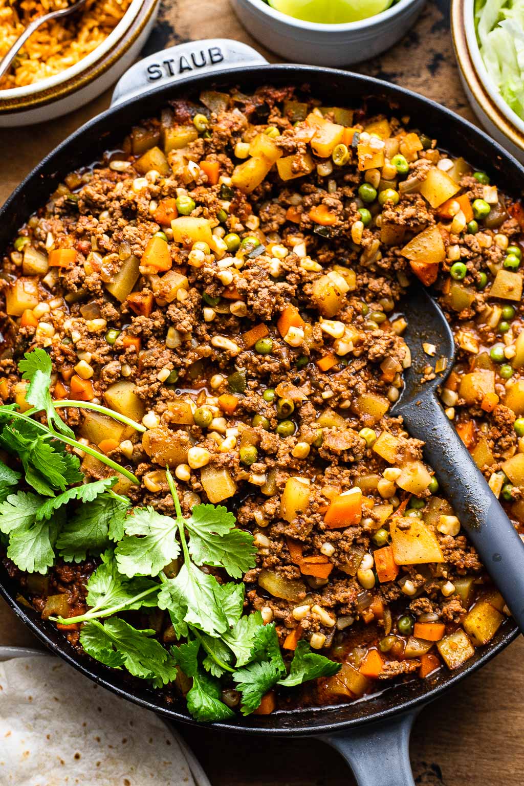 Mexican ground beef and potato mixture in a skillet 