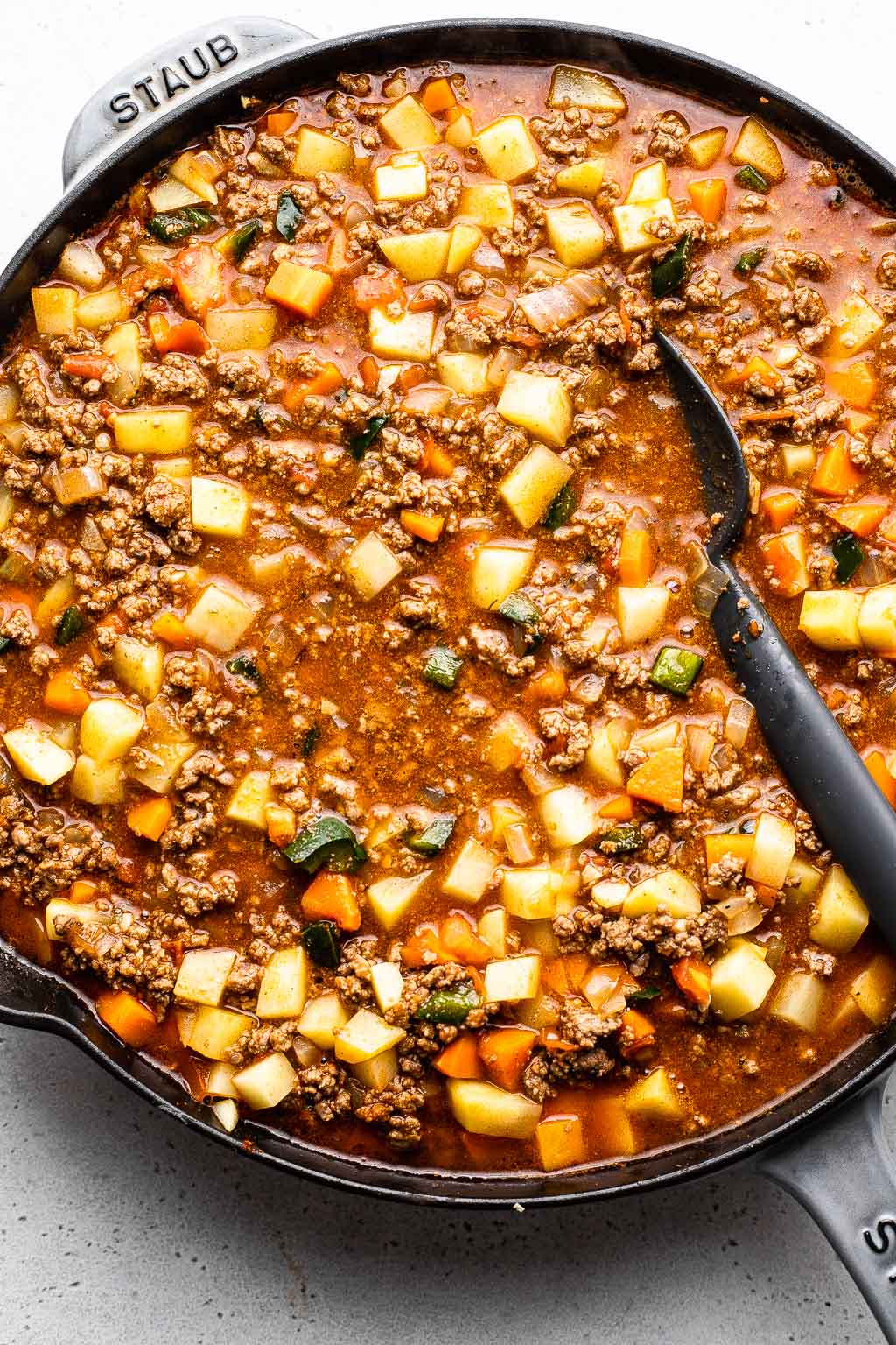 Simmering picadillo in a skillet 