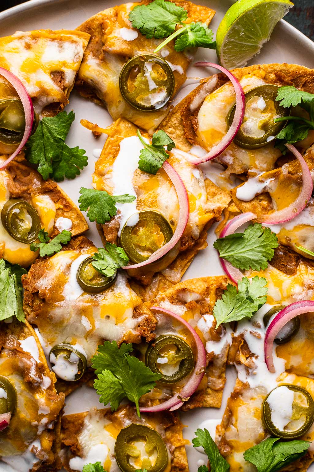 Loaded Texas-style nachos with lime 