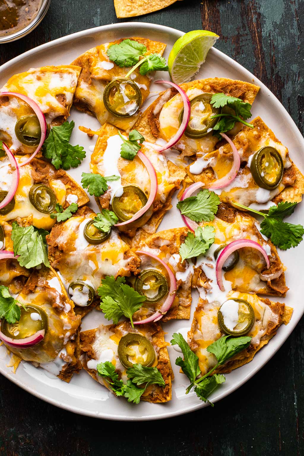 Loaded Texas-style nachos on a plate
