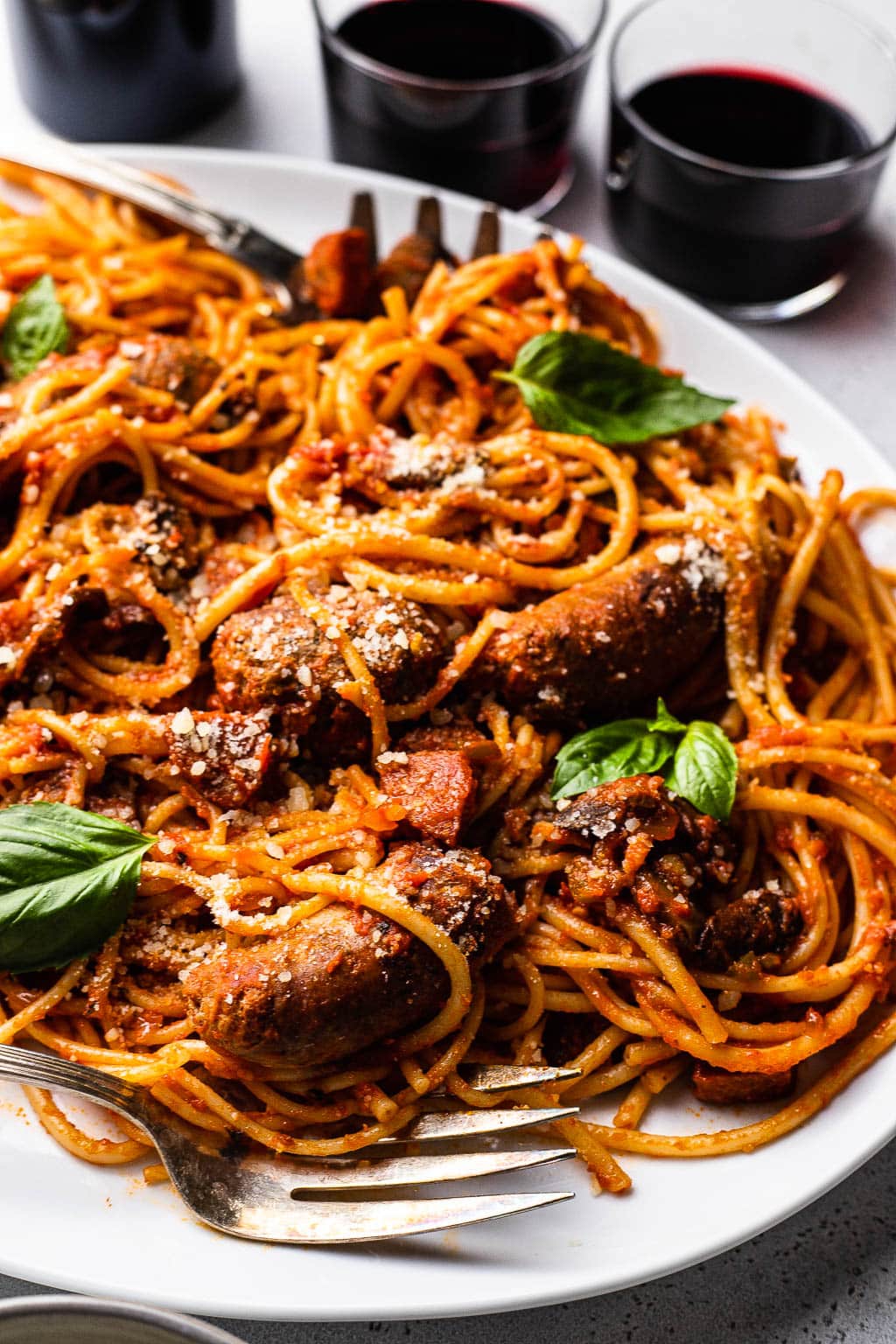 A plate of pasta tossed in Sunday sauce 
