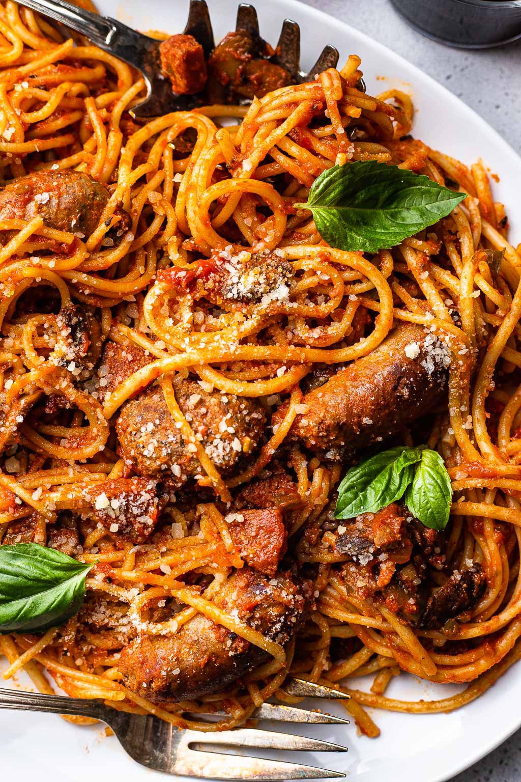 A plate of pasta tossed in Sunday sauce 
