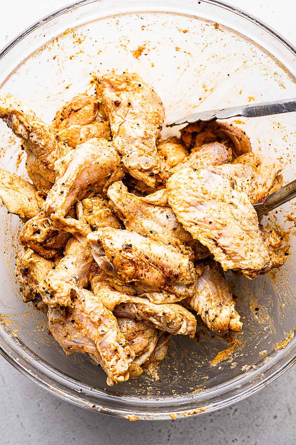 Chicken wings seasoned with dry rub 