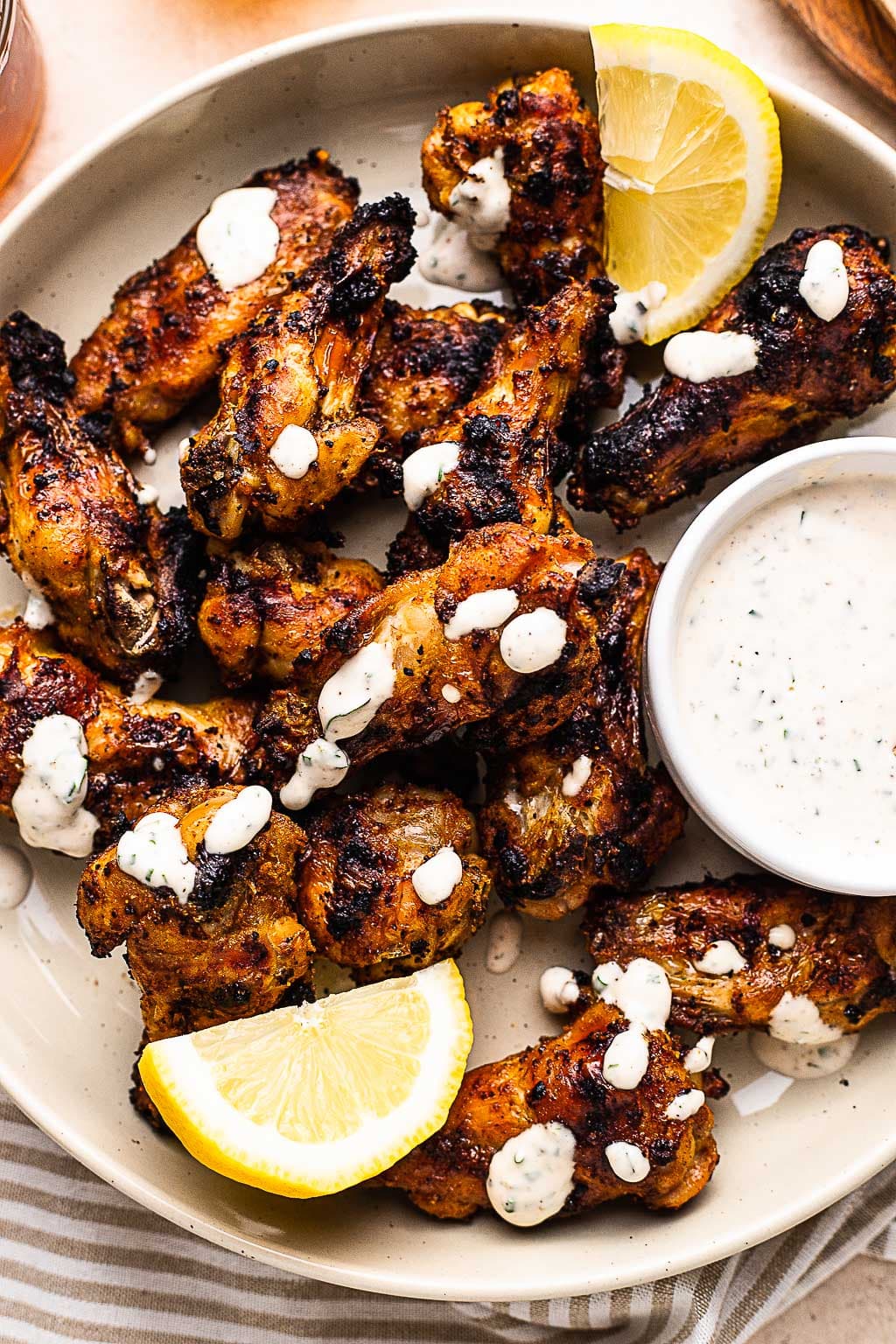 Grilled Chicken Wings on a plate with ranch